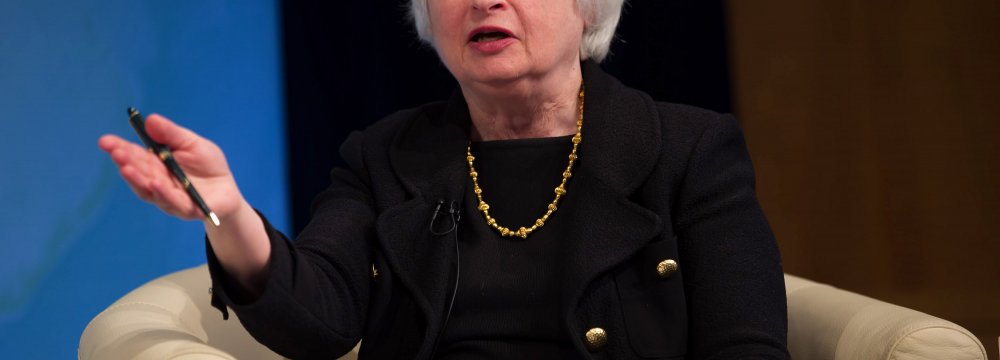 Yellen says economic growth slowed slightly in the  July-September quarter.