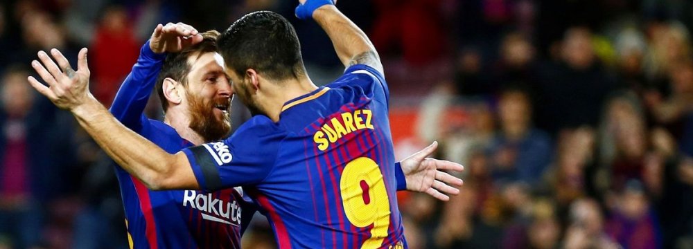  Lionel Messi (L) and Luis Suarez, two most affective players of the match