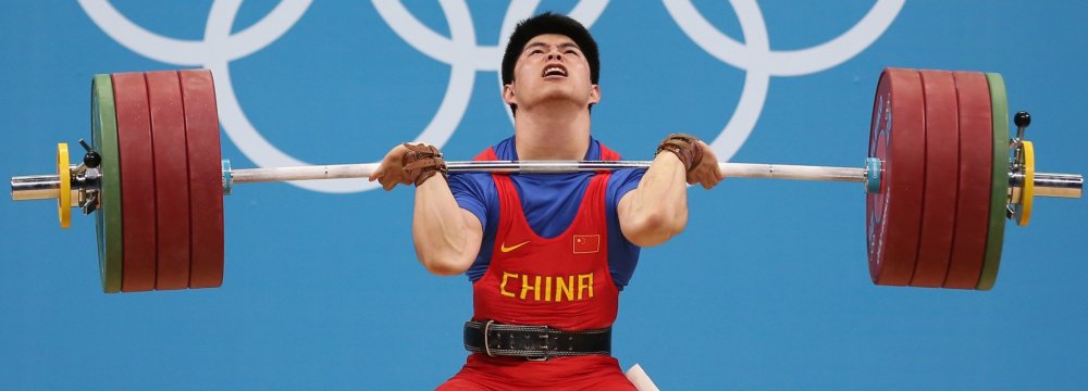 China is among nine countries facing a year’s ban from weightlifting because of doping records.
