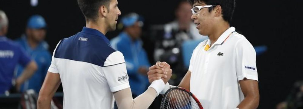 Novak Djokovic (L) and Chung Hyeon