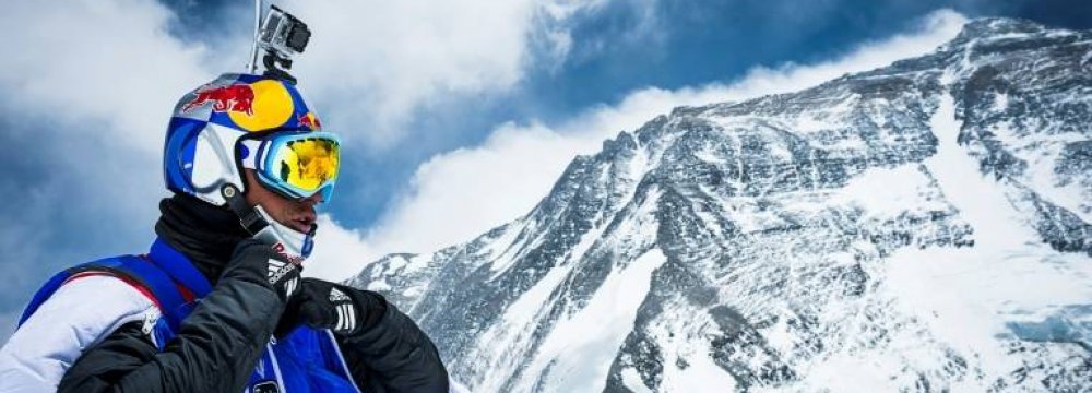 Valery Rozov is pictured preparing to jump off the north face of Mount Everest into Tibet in China, May 2013.