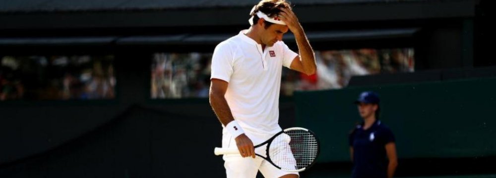 Roger Federer is out of Wimbledon after throwing away two-set lead.