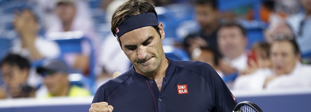 Federer Wears Down Wawrinka in Cincinnati