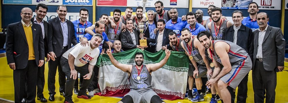 The Iranian team celebrates its victory over Lebanese side at the event.