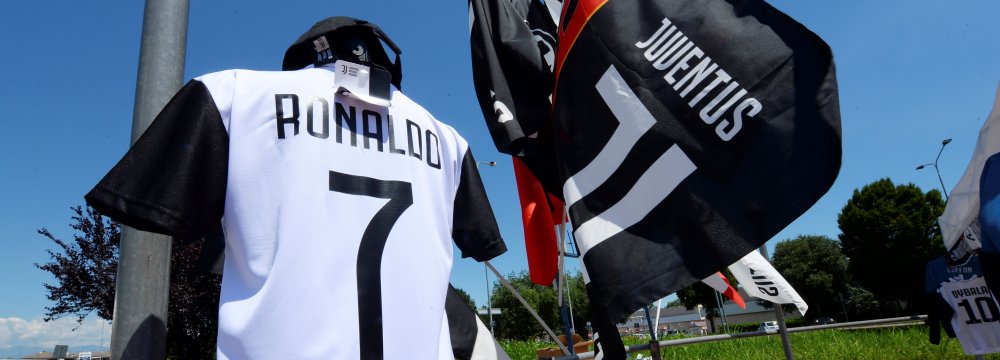 A Juventus’ jersey with the name of Cristiano Ronaldo  is exhibited in a shop in Turin.