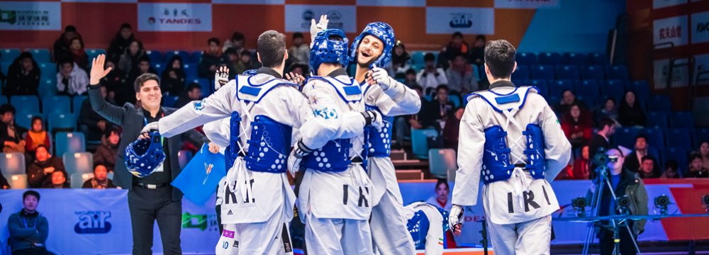 Iranian taekwondokas celebrating victory