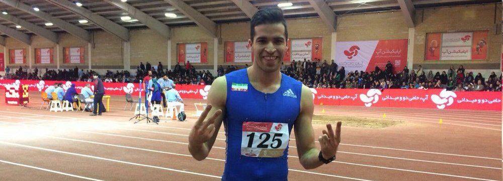  Hassan Taftian after winning a gold medal at the 28th Asian Indoor Athletics Games in Tehran.