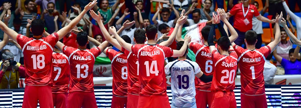 Iranian roster celebrate the victory with their fans.