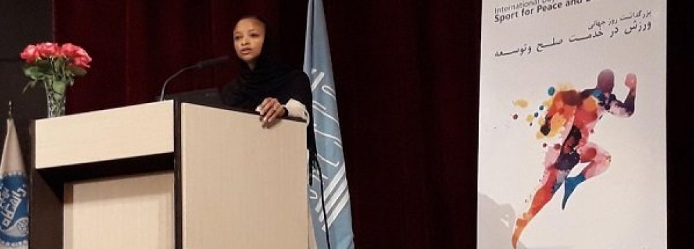 Esther Kuisch-Laroche delivering a speech at the ceremony.