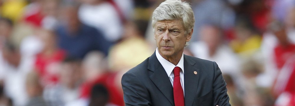 Wenger Charged for Comments About Referee