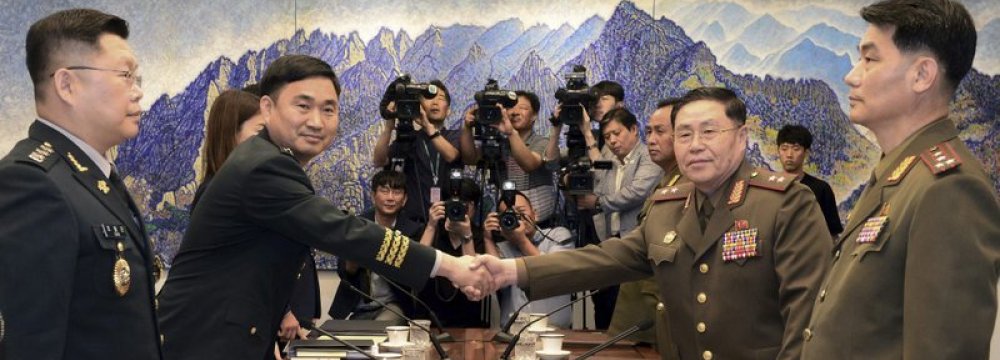 Two Koreas Discuss Reducing Military Tension