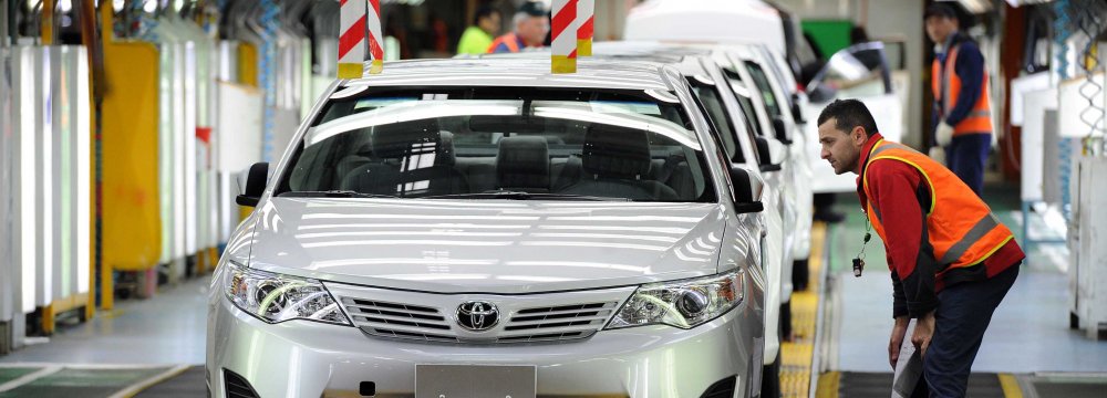 Toyota's shares fell 1.7% Friday in Tokyo.
