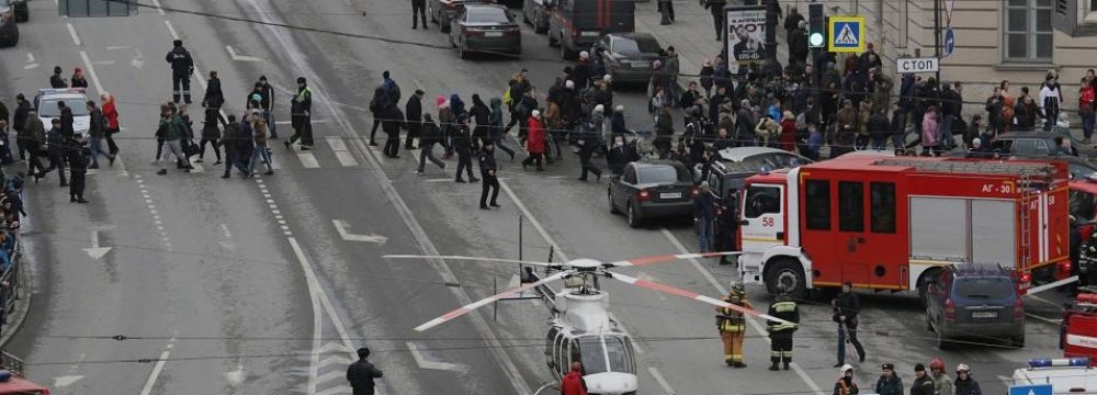 General view of emergency services attending the scene outside Sennaya Ploshchad metro station, following explosions in two train carriages in St. Petersburg, Russia April 3. 