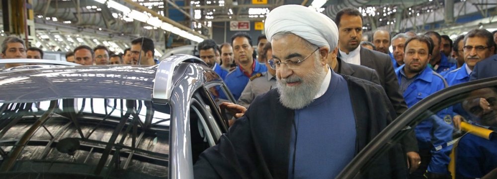 President Rouhani Launches Iran Khodro&#039;s Peugeot 2008 Production Line