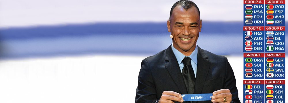 Brazil’s former defender Cafu displays the slip of Iran during the Final Draw for the 2018 FIFA World Cup football tournament at the Kremlin Palace on December 1. (Photo: AFP)