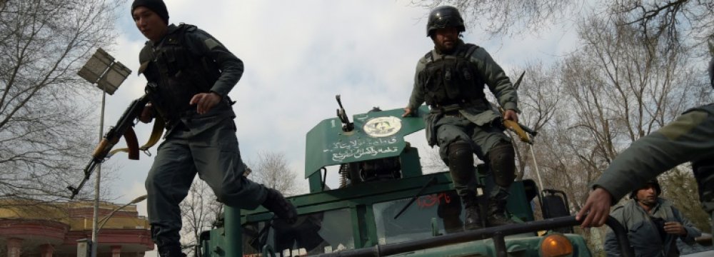 Afghan security forces surround Kabul’s Sardar Daud Khan Hospital on March 8.