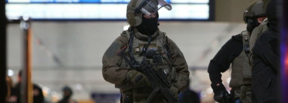 Special police commandos arrive at the main train station  in Dusseldorf, western Germany, on March 9.