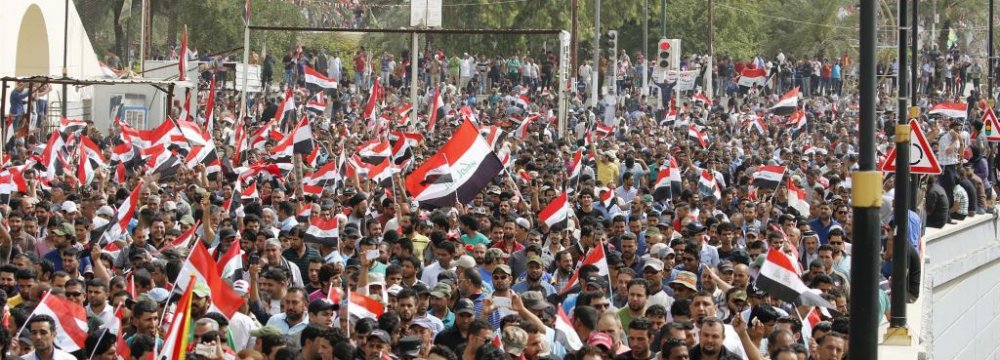Supporters of Iraqi Shia cleric Moqtada al-Sadr demonstrate in Baghdad, Iraq, on Feb. 11.