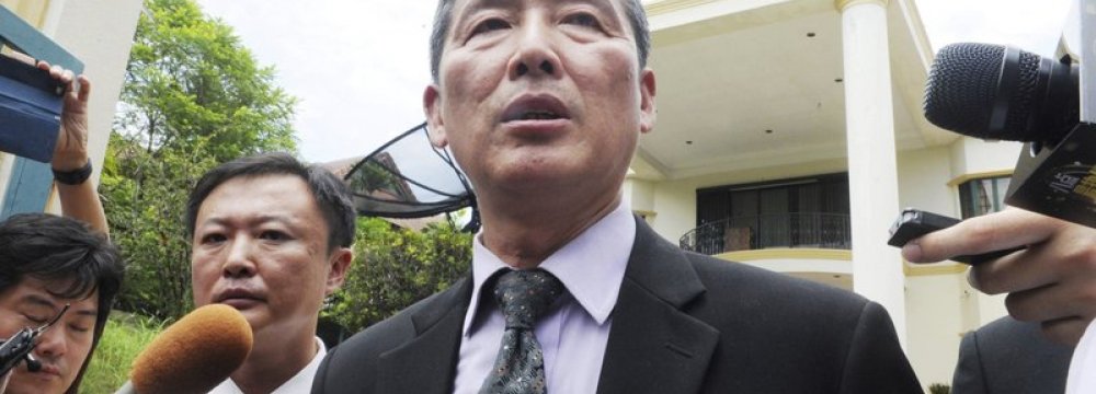 Ri Tong-il, former North Korean deputy ambassador to the United Nations, speaks to reporters outside the North Korean Embassy in Kuala Lumpur, Malaysia, on Feb. 28.