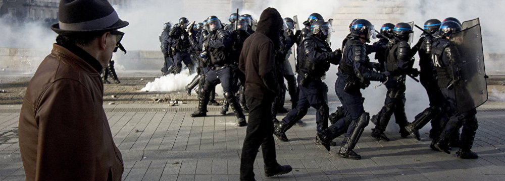 Riot police face off protesters in Nantes, France, on Feb. 25.
