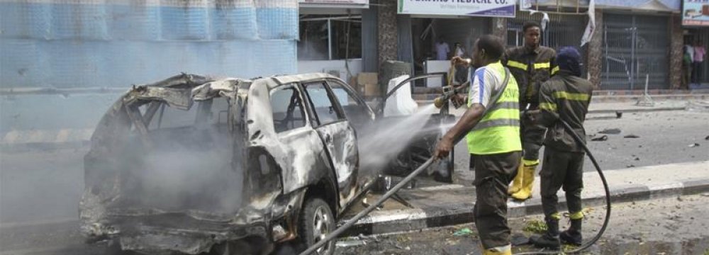 The wreck of the car used in a bombing in Mogadishu
