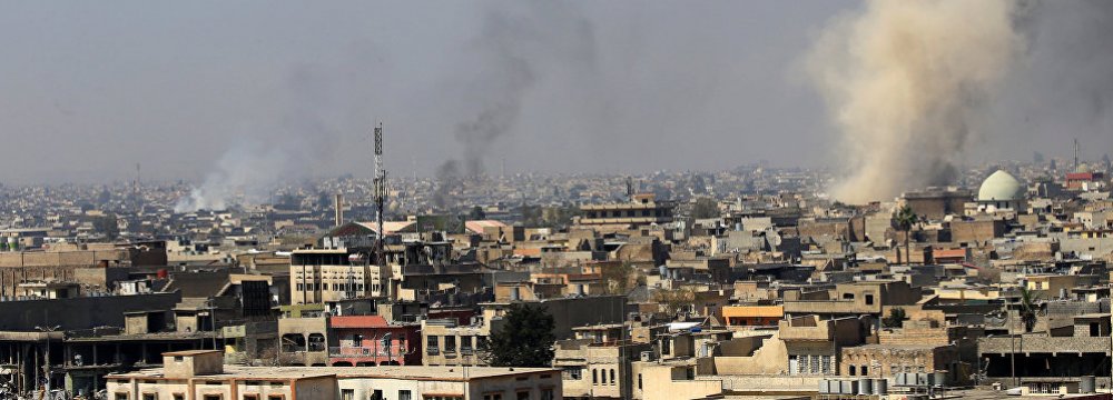 Smoke rises from the Old City in Mosul, Iraq. (File Photo)