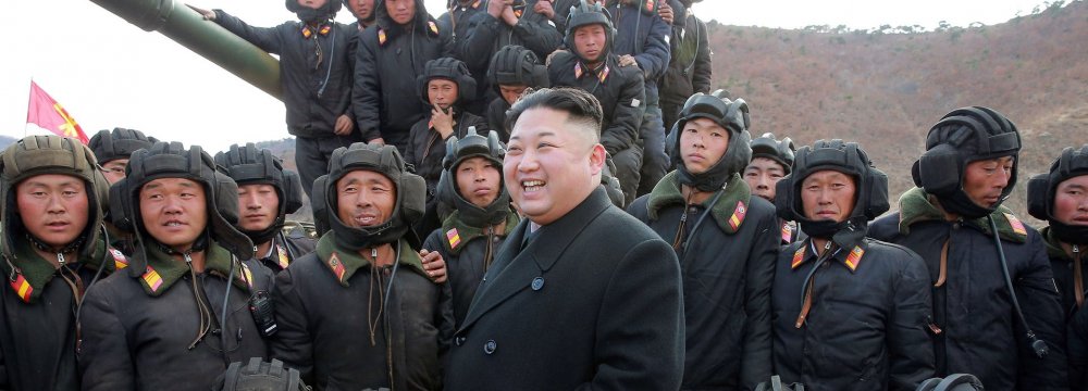 Kim Jong-un, the North Korean leader, with tank crews, in an undated photograph.