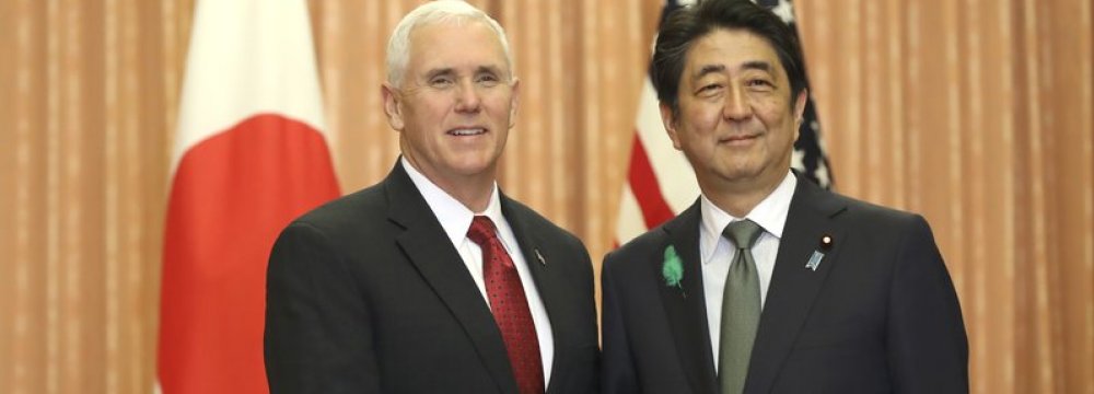 Shinzo Abe (R) and Mike Pence meet in Tokyo, Japan, on April 18.