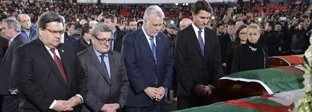 Canadian political figures participate in the public funeral service in Quebec, Canada, on Feb. 2.