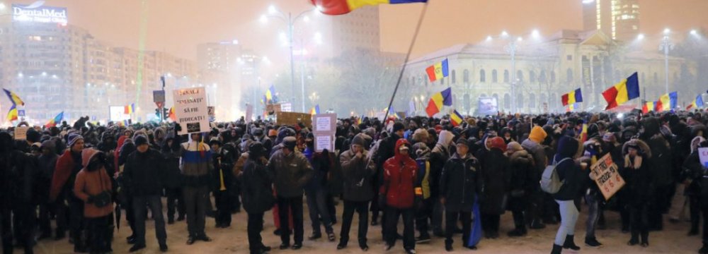 Romanian Minister  Quits Amid Protests