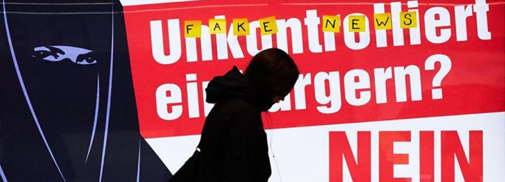 A poster urges voters to reject “uncontrolled citizenship”.