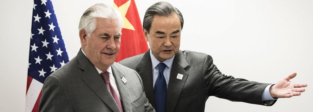 US Secretary of State Rex Tillerson (L) and China’s Foreign Minister Wang Yi meet on the sidelines of the G20 in Bonn, western Germany, on Feb. 17.