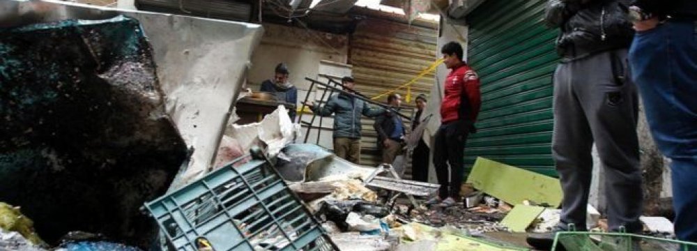 Baghdad Blasts  Kill Dozens
