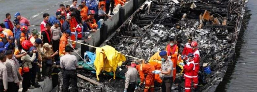 The wreckage of the burned passenger boat