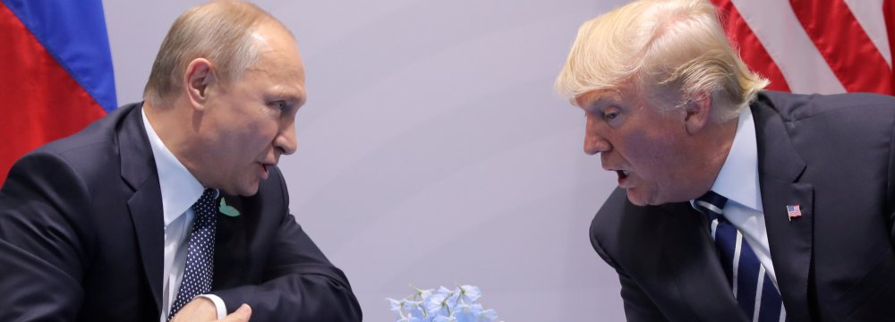 US President Donald Trump (R) and his Russian counterpart Vladimir Putin met during a meeting at the G20 Summit, July 7, 2017, in Hamburg, Germany.