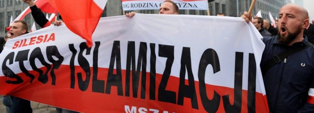 Demonstrators chant “God, Honor, Homeland” and “Stop Islamization” in a xenophobic rally in Poland  in Nov. 2015. (File Photo) 