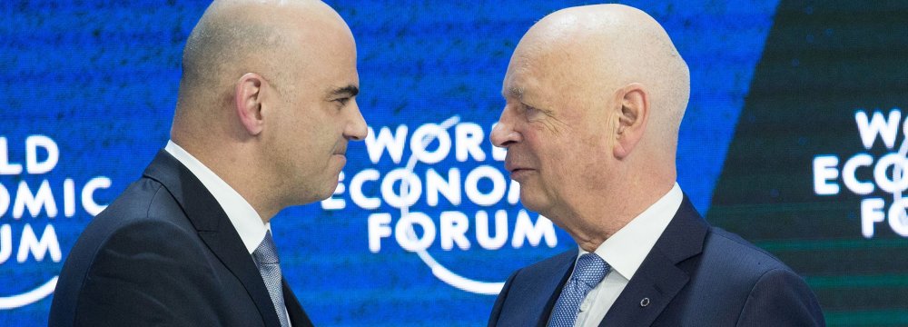 Alain Berset (L) and Klaus Schwab at the WEF on January 4.