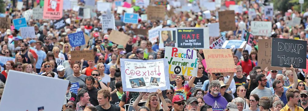 Demonstrators poured into the streets over the weekend to denounce white supremacy and Nazism, one week after clashes between far-right demonstrators and counterprotesters in Charlottesville.