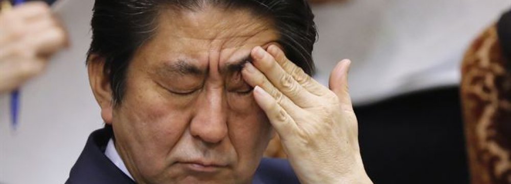 Embattled Abe May Quit in June