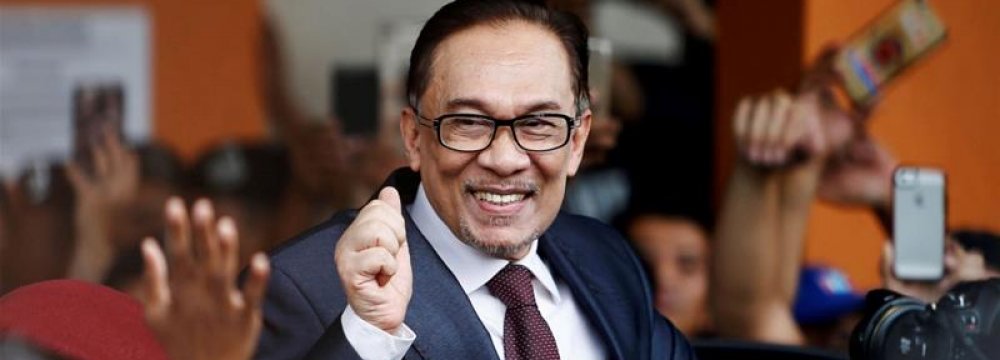 Malaysia&#039;s Anwar Pardoned, Paving Way for Return to Politics