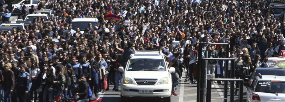 People march during a protest in Yerevan, Armenia, on April 23.