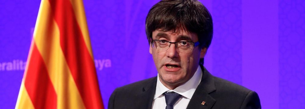 Ousted Catalonia Leader Faces Extradition to Spain