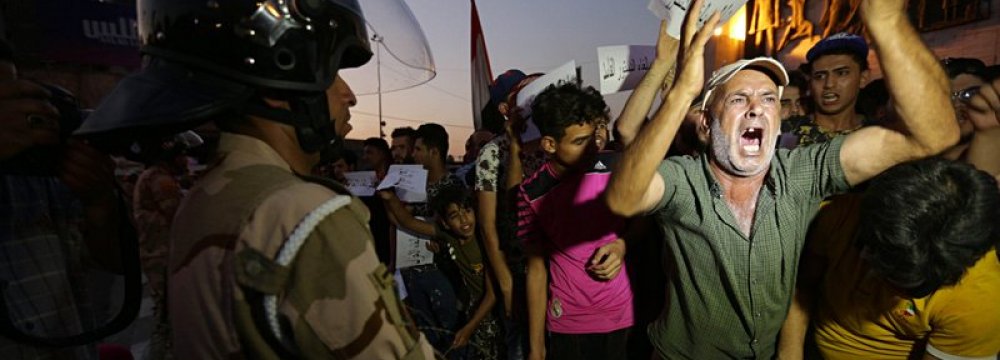 Protests Spread, Turn Deadly in Iraq