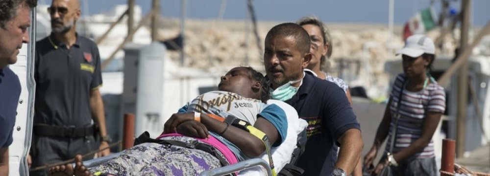 Italy Allows Migrants to Land in Sicily