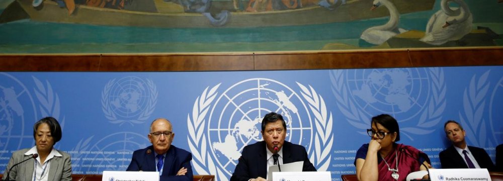 Members of the Independent International Fact-finding Mission on Myanmar attend a news conference on the publication of their final report at the UN in Geneva on August 27.
