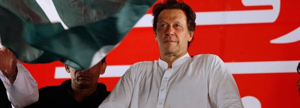 Imran Khan’s Party Begins Coalition Talks