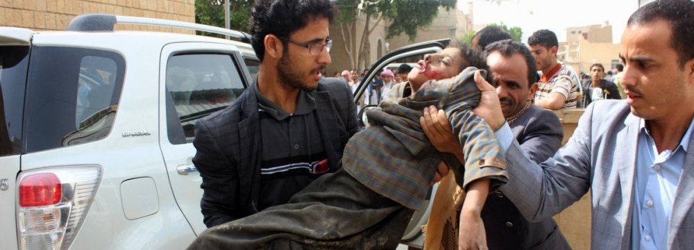 A child hurt in Saudi-UAE airstrike in Saada, Yemen, on August 9