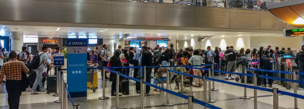 People stuck in a US airport due to Trump’s travel ban (File Photo)