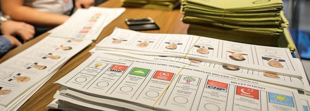 Voters will cast two separate ballot papers in the same envelope—one for the presidential and one for the parliamentary elections.