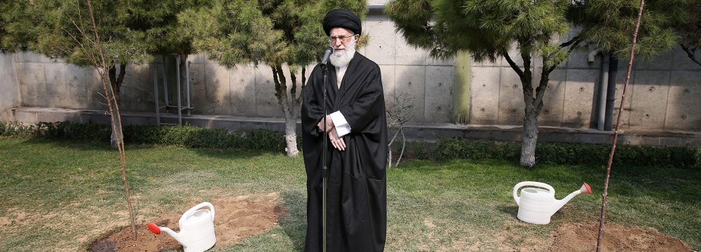 Ayatollah Seyyed Ali Khamenei plants saplings in Tehran on March 8. 
